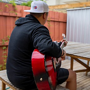 Playing guitar